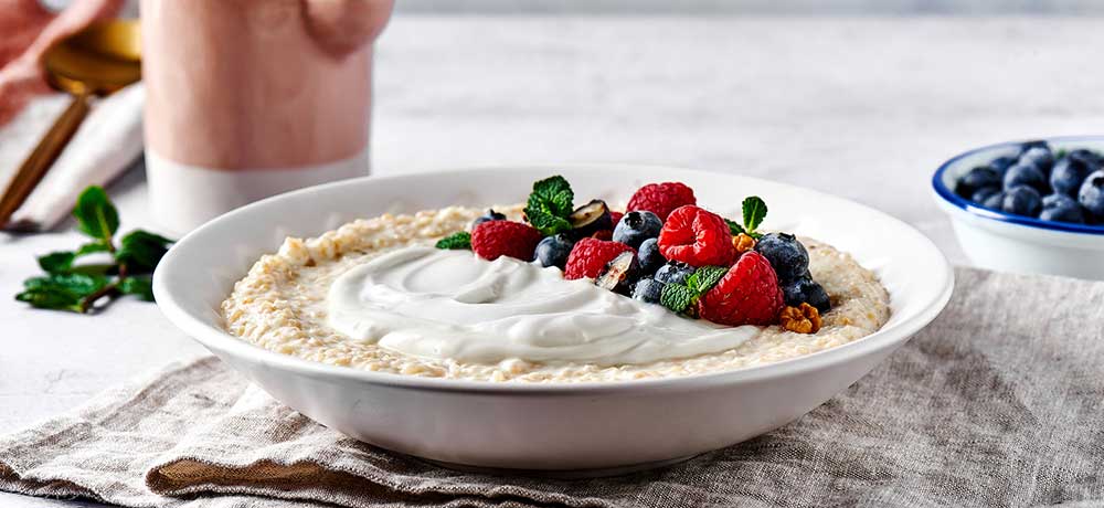 Kiri Greek Quinoa Oatmeal with Berries and Pecans